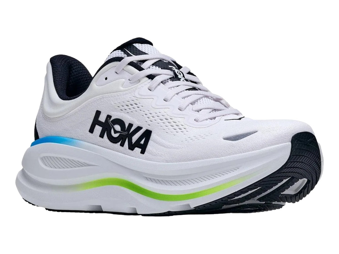 Tenis HOKA Bondi 9 color blanco con detalles en azul y verde neón y suela blanca gruesa